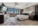 Well-lit bedroom with city views, contemporary furnishings, and sleek design at 9101 Alta Dr # 1206, Las Vegas, NV 89145