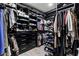 Walk-in closet with custom shelving and ample storage for clothes and accessories at 9101 Alta Dr # 1206, Las Vegas, NV 89145