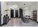 Modern dining room with sleek glass table, stylish seating, and contemporary lighting at 9101 Alta Dr # 1206, Las Vegas, NV 89145