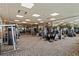 Large fitness center with modern equipment, mirrored walls, and a spacious layout for workouts at 9101 Alta Dr # 1206, Las Vegas, NV 89145
