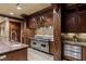 Gourmet kitchen with stainless steel appliances, custom cabinetry, and an island for food preparation at 9101 Alta Dr # 1206, Las Vegas, NV 89145