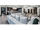Spacious living area showcasing an open floor plan with a gourmet kitchen and comfortable seating at 9101 Alta Dr # 1206, Las Vegas, NV 89145