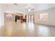 Spacious living room with tile flooring, bright, and airy; perfect for comfortable living and entertaining at 10858 La Florentina Ave, Las Vegas, NV 89166