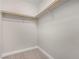 Walk-in closet with shelf and carpet at 10963 Mount Goyer St, Las Vegas, NV 89141