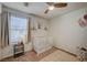 Calming Bedroom featuring a crib, soft lighting, and minimalist decor at 10990 Mountain Willow St, Las Vegas, NV 89179