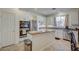 Modern kitchen with stainless steel appliances, granite countertops, and white cabinetry at 10990 Mountain Willow St, Las Vegas, NV 89179