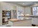 Well-equipped kitchen with stainless steel appliances, granite countertops, and ample cabinet space at 10990 Mountain Willow St, Las Vegas, NV 89179