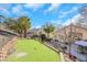 Expansive backyard featuring a putting green and ample space for recreation and outdoor enjoyment at 1312 Rolling Sunset St, Henderson, NV 89052