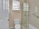 Bathroom featuring a glass shower and toilet at 1312 Rolling Sunset St, Henderson, NV 89052