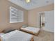 Comfortable bedroom with view of the backyard at 1312 Rolling Sunset St, Henderson, NV 89052