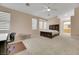 Large bedroom with multiple windows and a ceiling fan at 1312 Rolling Sunset St, Henderson, NV 89052