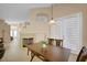 Dining room with fireplace and French doors at 1312 Rolling Sunset St, Henderson, NV 89052