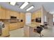 Spacious kitchen featuring an island, granite counters, and stainless steel appliances at 1312 Rolling Sunset St, Henderson, NV 89052