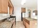 Kitchen featuring granite countertops, stainless steel appliances, and an island at 137 Rosa Rosales Ct, North Las Vegas, NV 89031