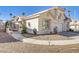 Charming home with low maintenance yard and sidewalk leading up to the front door and garage at 139 Serenade Ct, Henderson, NV 89074