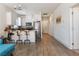 Open floor plan showcasing a kitchen with barstool seating and stainless steel appliances at 1410 Pink Dawn Dr, Henderson, NV 89014