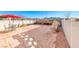 A low maintenance backyard includes a patio and decorative rock complemented by potted plants at 1631 Lefty Garcia Way, Henderson, NV 89002