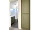 This bathroom features stylish green cabinets and modern fixtures at 1960 Verbania Dr, Las Vegas, NV 89134