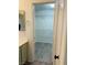 Bathroom walk-in closet with wire shelving and vinyl plank flooring at 1960 Verbania Dr, Las Vegas, NV 89134