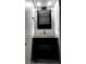 A modern powder room is shown with a sleek vanity and contemporary fixtures at 2641 Ruthe Duarte Ave, Las Vegas, NV 89121