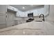 Close-up of kitchen with white counters, stainless appliances, and modern faucet at 2851 S Valley View Blvd # 1098, Las Vegas, NV 89102