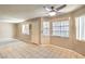 Bright dining area featuring tile flooring, large windows, and neutral decor providing a welcoming atmosphere at 328 S Buffalo Dr # 101, Las Vegas, NV 89145