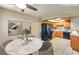 Cozy kitchen features a marble table, tile floors, and modern appliances at 328 S Buffalo Dr # 101, Las Vegas, NV 89145