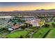 Panoramic aerial showcasing the community, golf course and mountain views at 3305 Fernbird Ln, North Las Vegas, NV 89084