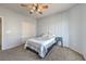 Comfortable bedroom features a decorative accent wall and a ceiling fan at 3305 Fernbird Ln, North Las Vegas, NV 89084