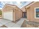 Charming single-story home featuring a two-car garage and a welcoming entrance at 3305 Fernbird Ln, North Las Vegas, NV 89084
