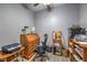 Office space with wooden desk, chair, shelving, and printer at 3305 Fernbird Ln, North Las Vegas, NV 89084
