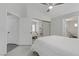 Bright bedroom showcasing access to an ensuite bathroom and closet with mirrored doors at 3425 Conan St # 103, Las Vegas, NV 89129
