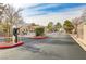 Gated community entrance provides security and privacy, with well-maintained landscaping adding to its appeal at 3425 Conan St # 103, Las Vegas, NV 89129