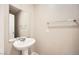 Bathroom features a modern vanity with stylish mirror and lighting at 4052 Rocky Beach Dr, Las Vegas, NV 89115