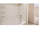 Bright bathroom features a tile shower and tub combo for relaxation at 4052 Rocky Beach Dr, Las Vegas, NV 89115
