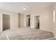 Bedroom with neutral carpeting, paint and ample closet space at 4052 Rocky Beach Dr, Las Vegas, NV 89115