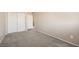 Clean bedroom with carpet, neutral paint, and a double door closet at 4052 Rocky Beach Dr, Las Vegas, NV 89115