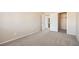Spacious bedroom offers neutral carpet, paint, and open closet space at 4052 Rocky Beach Dr, Las Vegas, NV 89115