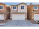 Two-story home features a two car garage and a well maintained front yard at 4052 Rocky Beach Dr, Las Vegas, NV 89115