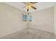 Bedroom featuring neutral carpet, ceiling fan and natural light at 409 Rutherford Cir, Las Vegas, NV 89123
