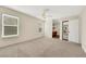 Large primary bedroom has wood-look floors in the bathroom and lots of natural light at 409 Rutherford Cir, Las Vegas, NV 89123