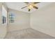 Bedroom featuring neutral carpet, ceiling fan and natural light at 409 Rutherford Cir, Las Vegas, NV 89123