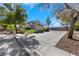 Elegant two-story home with a well-manicured front lawn and inviting curb appeal at 409 Rutherford Cir, Las Vegas, NV 89123