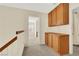 Bright hallway features built-in cabinetry and access to the bathroom and another room at 409 Rutherford Cir, Las Vegas, NV 89123