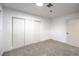 Carpeted bedroom with closet, white walls, and recessed lighting at 4667 E Boston Ave, Las Vegas, NV 89104