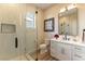 Bright bathroom with modern vanity, walk-in shower, and stylish fixtures at 4796 Riva De Romanza St, Las Vegas, NV 89135