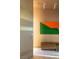 Bright and airy entrance with unique wood accents and an eye-catching piece of colorful art at 4918 Summit Overlook Dr, Las Vegas, NV 89135