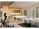 Stunning open-concept living and dining area with modern finishes and abundant natural light at 4918 Summit Overlook Dr, Las Vegas, NV 89135