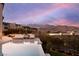 Enjoy the infinity pool and mountain views in this serene backyard setting at 4918 Summit Overlook Dr, Las Vegas, NV 89135
