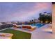Relax by the pool with panoramic city and mountain views from the backyard oasis at 4918 Summit Overlook Dr, Las Vegas, NV 89135